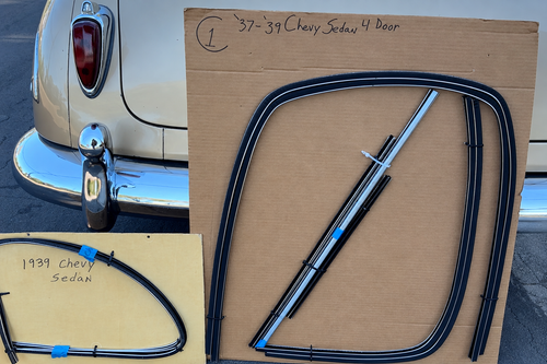 1937–1939 Chevy four-door sedan formed window channel kit on a large board, with slider components on a smaller board.