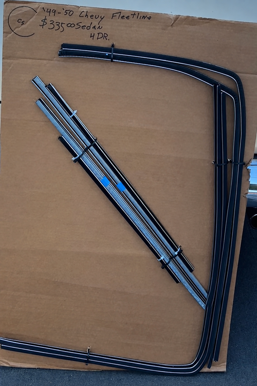1949–1950 Chevy four-door Sedan/Fleetline window channel kit with formed run channels and straight components on a cardboard board.