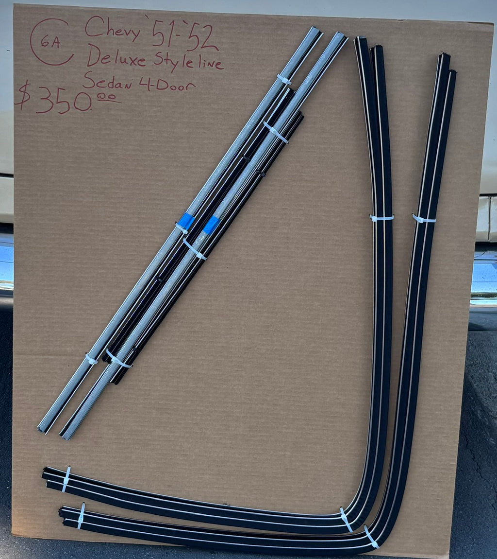  1951–1952 Chevy Deluxe Styleline four-door sedan window channel kit with formed run channels and straight components arranged on a cardboard board.