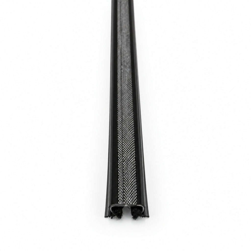Open end of cloth-covered window run channel showing the inner lining and stainless steel beaded edges.
